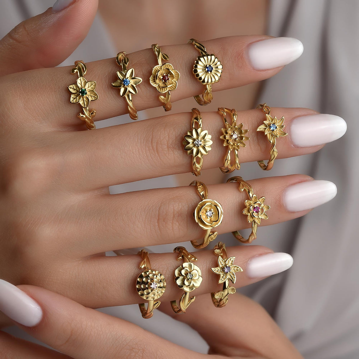 Birth flower rings shown across several months