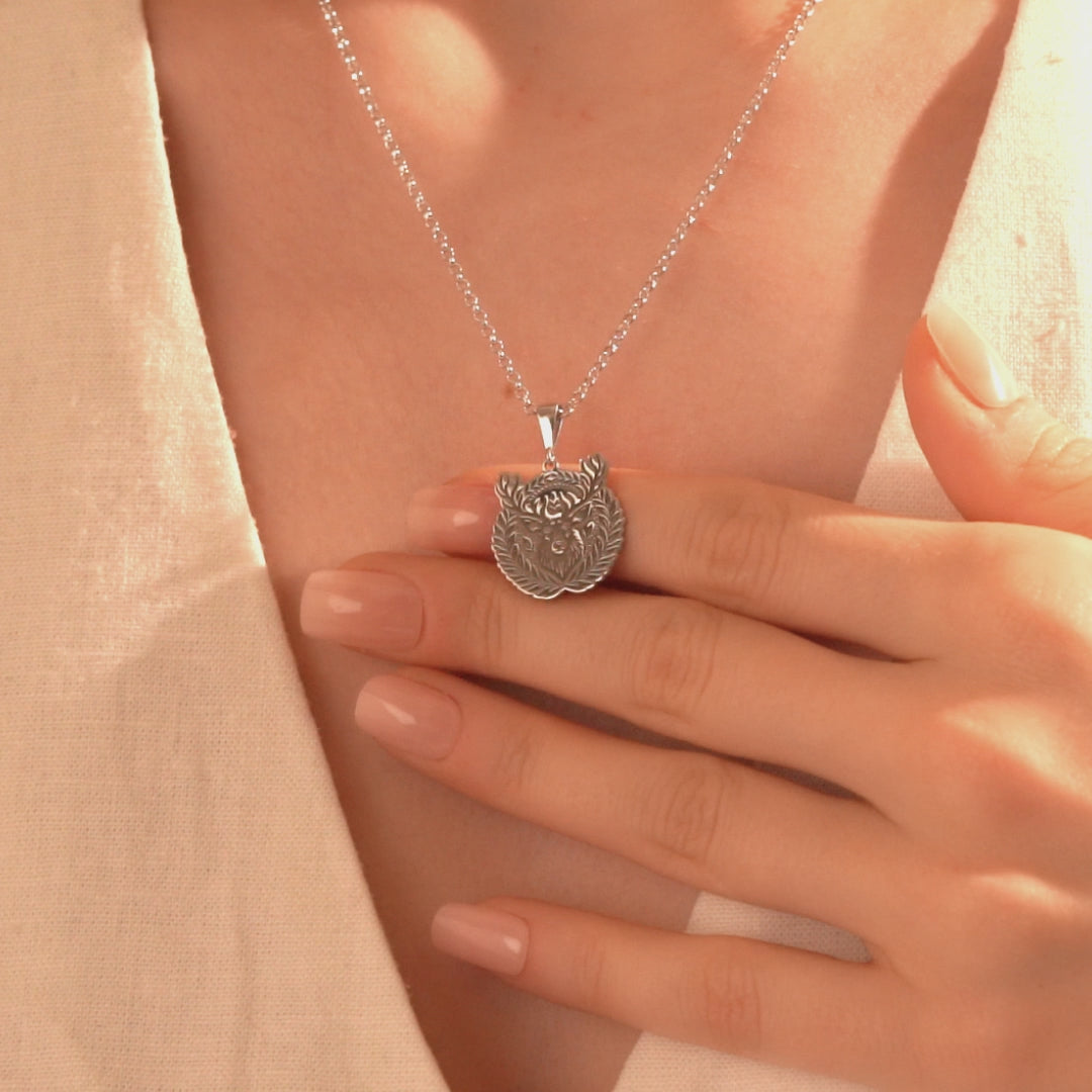 Silver botanical deer medallion necklace