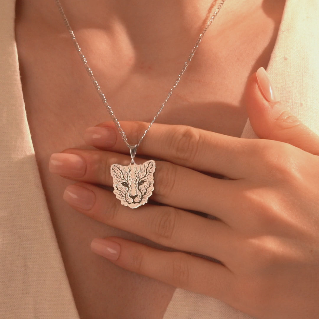 Silver fox pendant necklace with intricate leaf detailing