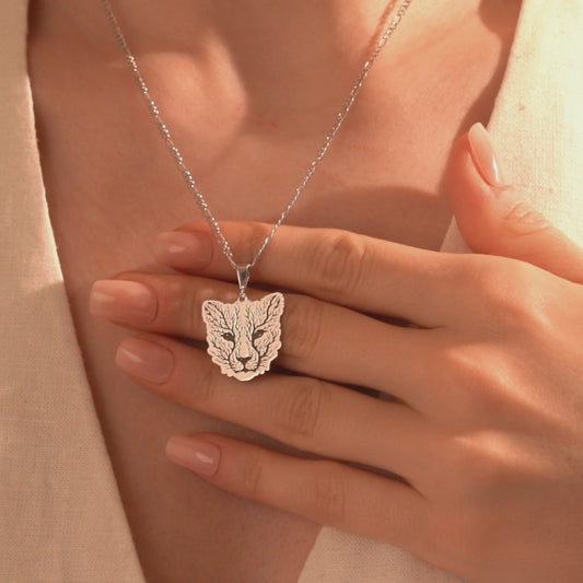 Silver fox pendant necklace with intricate leaf detailing