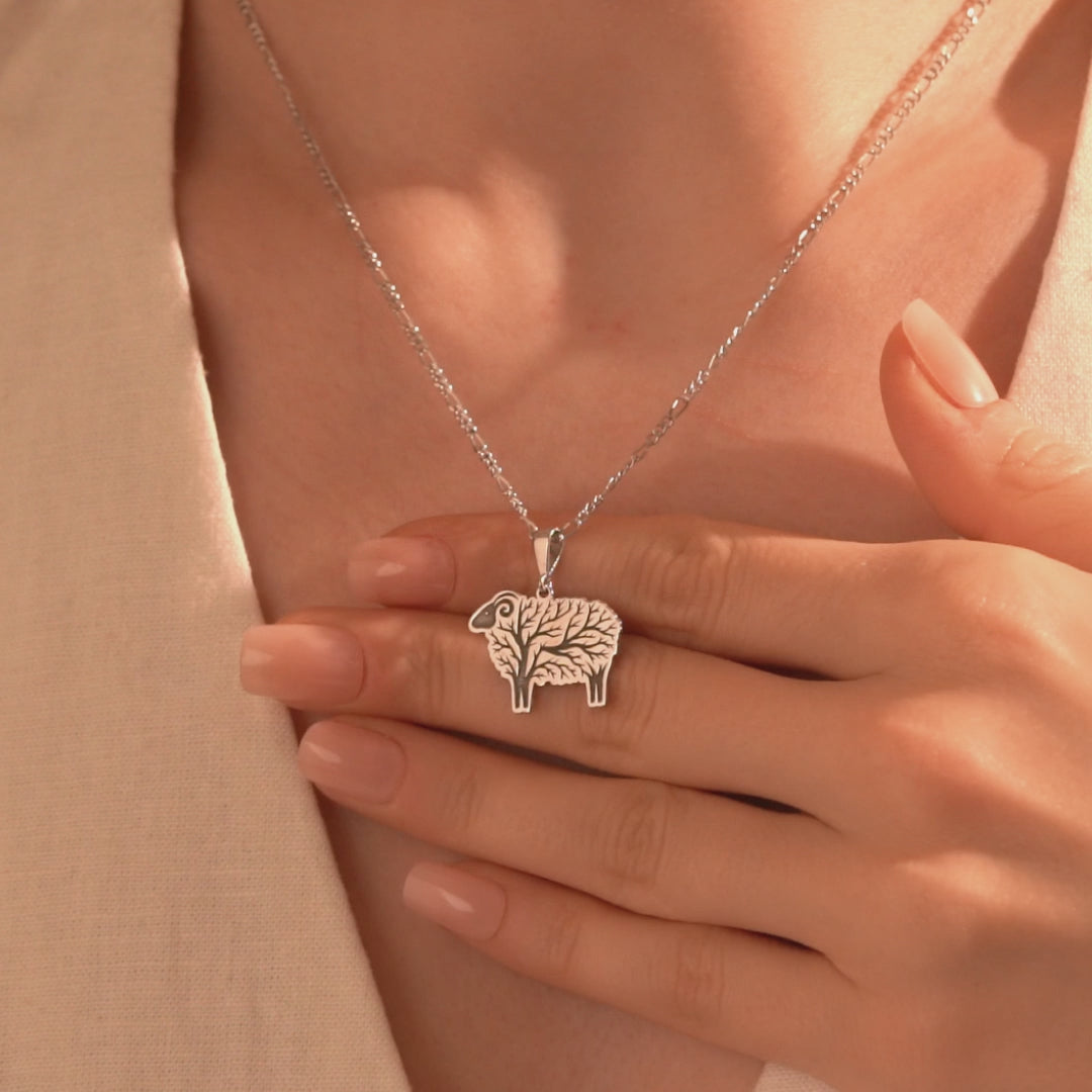 Detailed silver sheep necklace with Tree of Life design