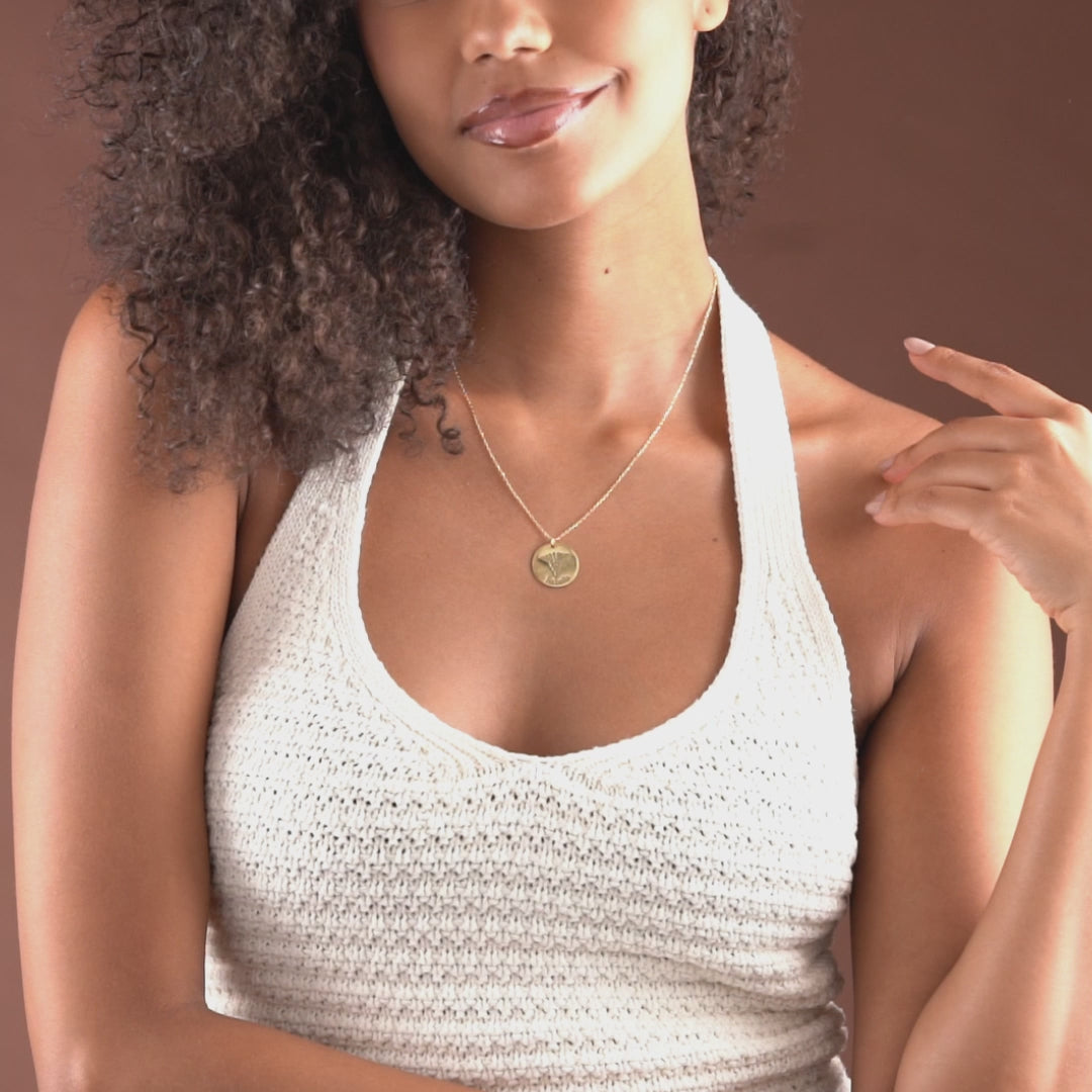 Video showing personalized medical symbol necklace details