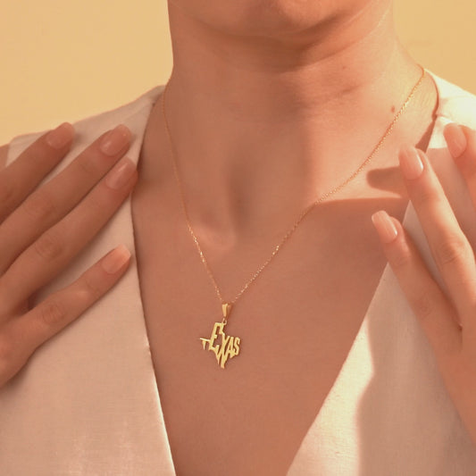 Gold Texas state necklace with TEXAS script pendant