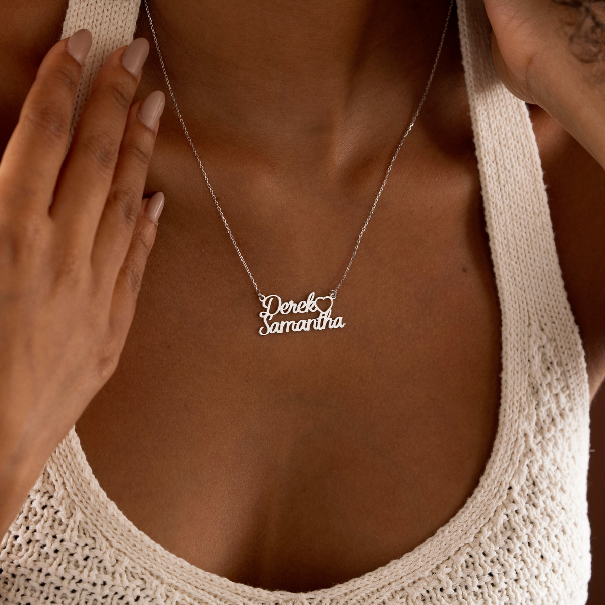 Personalized double name necklace displayed on a woman